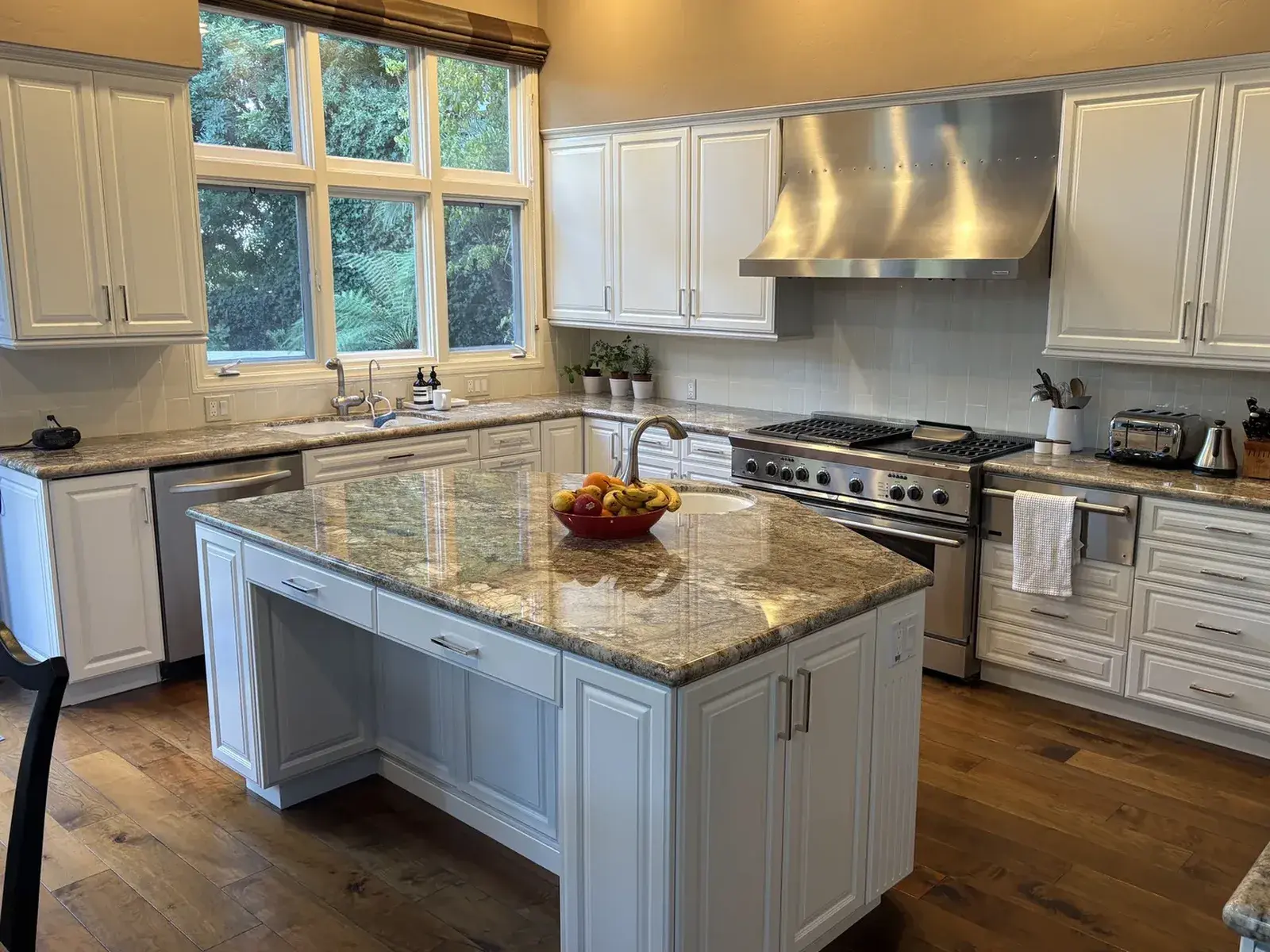 The same kitchen cabinets after a smooth sprayed Italian 2K polyurethane refinish